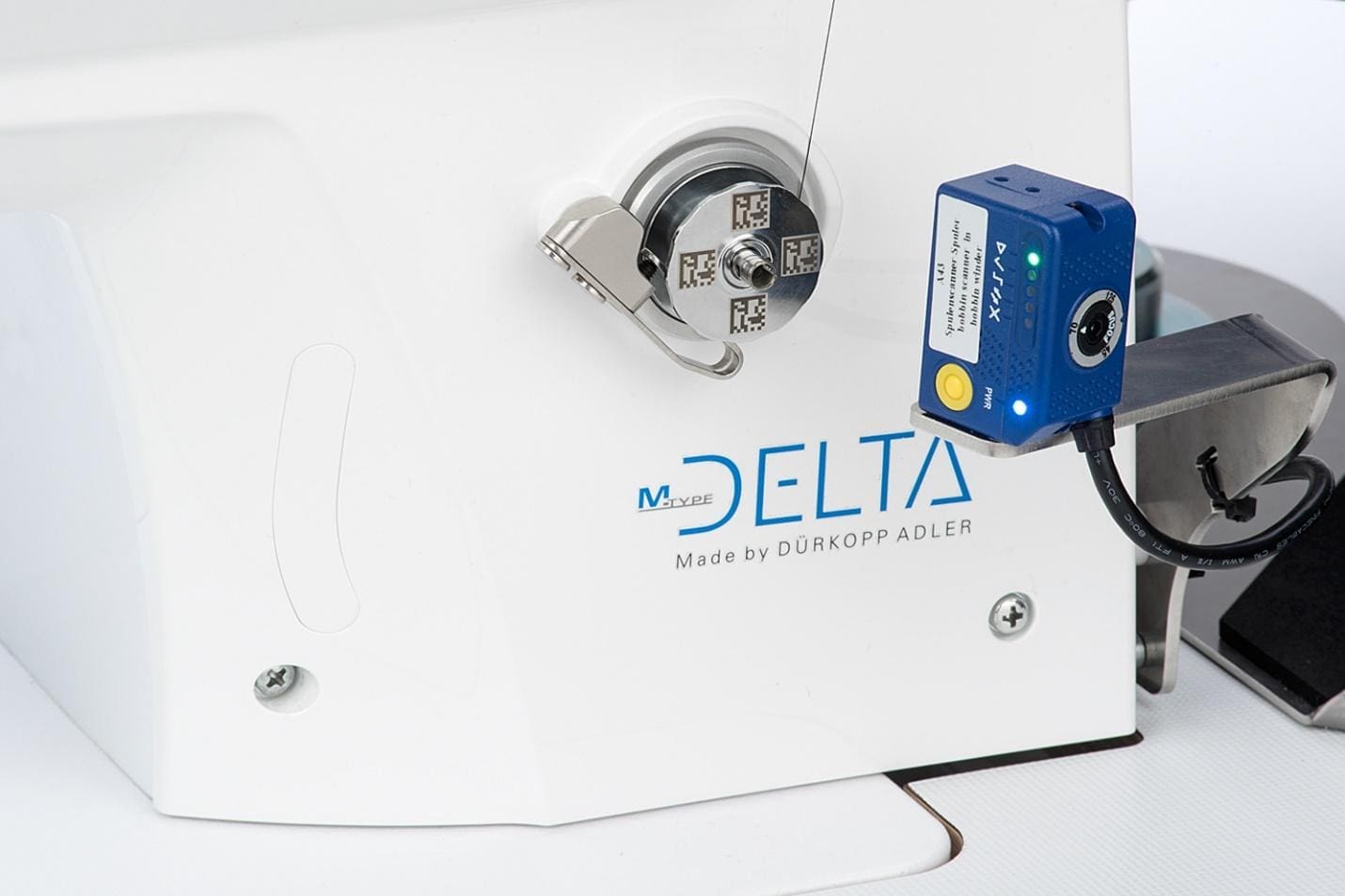 A delta device is attached to the side of a boat.