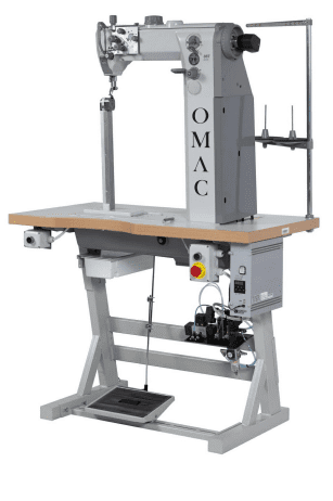 Industrial sewing machine with wooden tabletop.