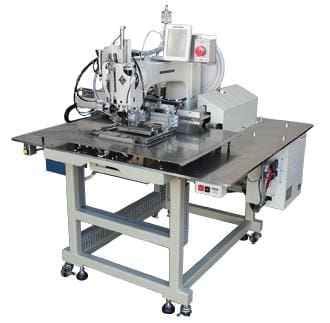 Industrial sewing machine with metal work surface.