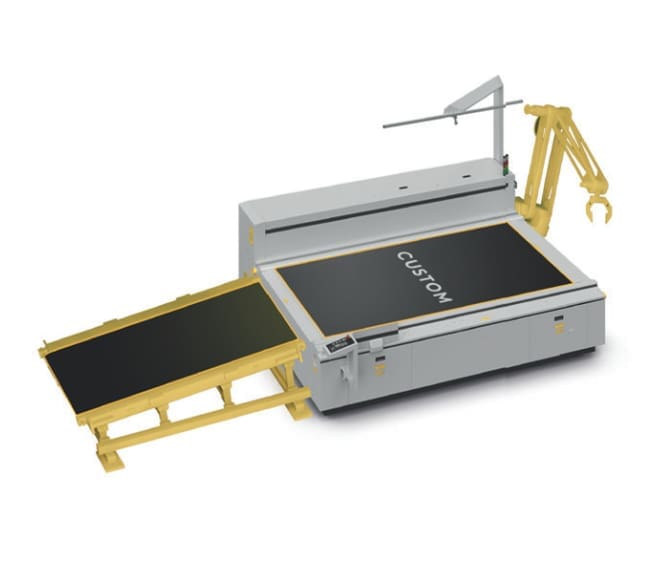 Industrial cutting machine with robotic arm.